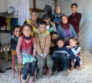The Assad family fled the Syrian civil war and wound up in a refugee camp in the Bekaa Valley in Lebanon. While grateful for their safety, winter has been cruel to the family and thousands of other refugees. (Photo by Leah Reynolds)