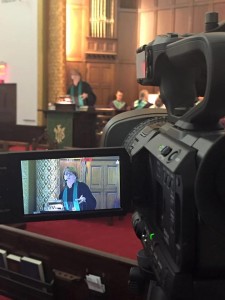 With a high-tech camera rolling, Susan Sparks preaches a Sunday service at Madison Avenue Baptist Church in New York City. Sparks said she is deliberately including the church's online members in her sermons. (Photo/Madison Avenue Baptist)