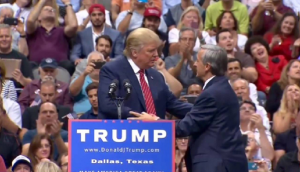 Presidential candidate Donald Trump calls Pastor Robert Jeffress to the podium at a rally this week in Dallas. (donaldjtrump.com)