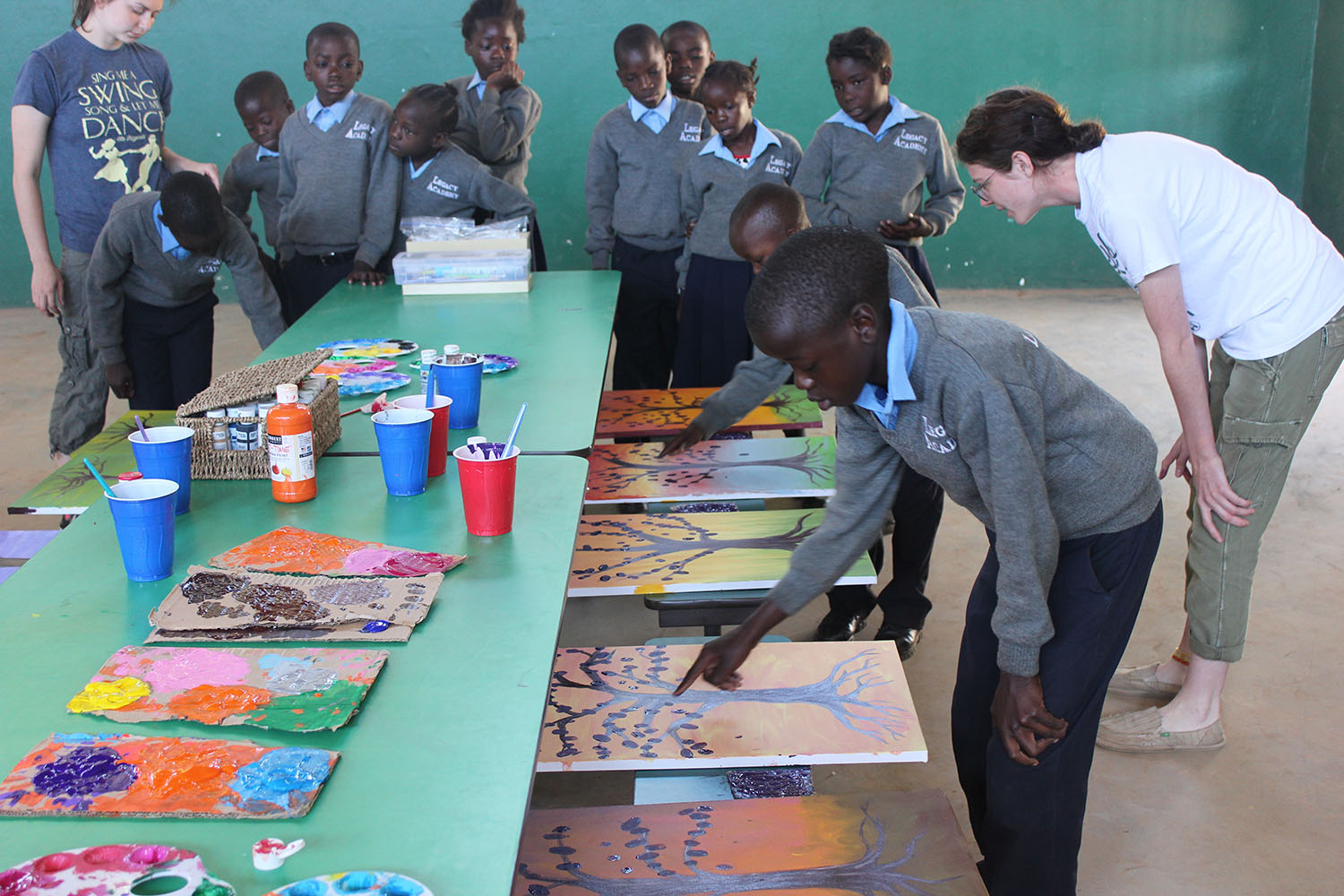 Students at Legacy Academy added their fingerprints to canvases as leaves on the trees. The paintings raised more than $45,000 for the Tree of Life Children's Village near Lusaka, Zambia. (Photo/Baylor University)