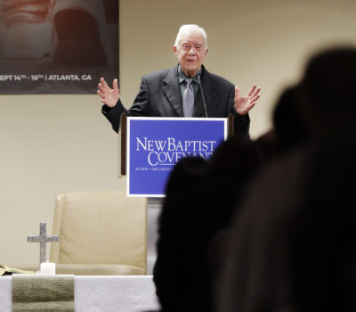 Former President Jimmy Carter says some white Americans stay quiet when they see racism or discrimination, fearful of losing a “position of privilege” in society. (AP Photo/David Goldman)